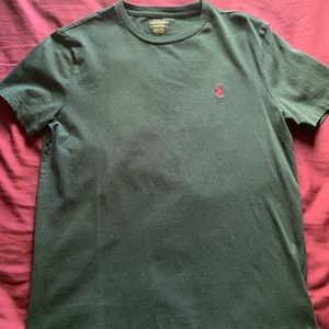 Brand new adult small polo tee.